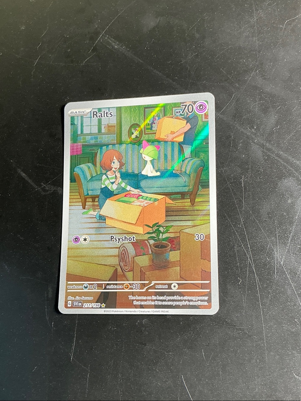 Ralts Pokémon Holo Promo Card - Green / White Artwork